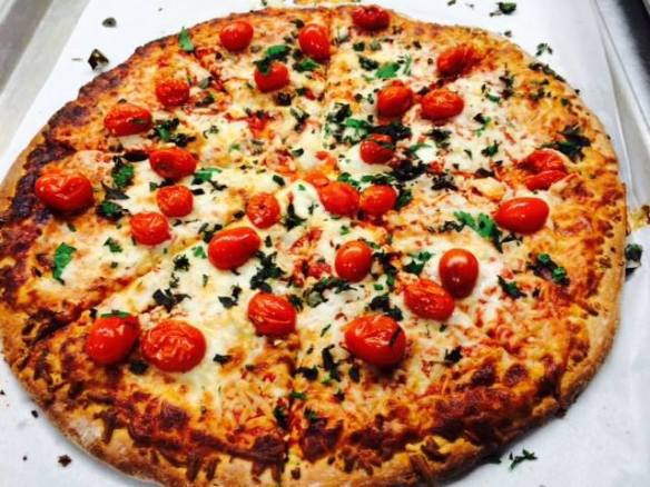 House-made pizza with local tomatoes and basil from the Oyster River (NH) school garden